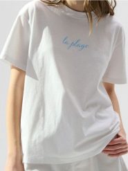 Koszulka z nadrukiem na plecach - biały. Białe t-shirty damskie Sinsay, l, bez wzorów, bez kołnierzyka. W wyprzedaży za 12.99 zł.