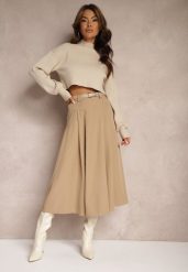 Beżowa Spódnica o Rozkloszowanym Kroju Wykończona w Talii Gumką i Paskiem Evinds. Brązowe spódnice damskie Renee, l, z aplikacjami, z bawełny, eleganckie, midi, dopasowane. Za 139.99 zł.