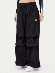 Adidas Spodnie dresowe Essentials Ripstop JD0785 Czarny Loose Fit. Czarne spodnie dresowe damskie Adidas, xs, bez wzorów, z dresówki. Za 169.99 zł.