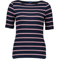 Koszulka w kolorze granatowo-czerwonym. Niebieskie t-shirty damskie Tom Tailor Adults, w paski, z bawełny, z dekoltem w łódkę. W wyprzedaży za 43.95 zł.