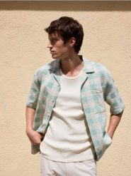 Tank top slim fit - złamana biel. T-shirty męskie Reserved, l, bez wzorów, z bawełny, bez kołnierzyka. Za 59.99 zł.