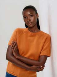 Bawełniany sweter - pomarańczowy. Brązowe swetry damskie Reserved, l, bez wzorów, z bawełny, bez kołnierzyka, bez ramiączek, bez kaptura. Za 109.99 zł.