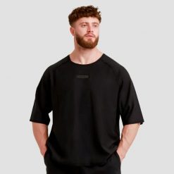 Koszulka męska fitness oversize Unity. Czarne koszulki sportowe męskie GYMBEAM, m, bez wzorów, z bawełny, bez kołnierzyka, bez ramiączek, na fitness i siłownię. Za 65.90 zł.