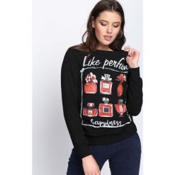 Czarna Bluza Paradise Island. Czarne bluzy damskie Born2be, na jesień. Za 29.99 zł.