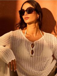 Ażurowy sweter z bawełny - kremowy. Białe swetry damskie Sinsay, l, w ażurowe wzory, z bawełny, bez kołnierzyka, bez ramiączek, bez kaptura. Za 49.99 zł.