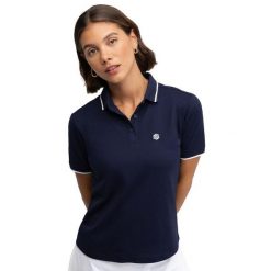 Damska golfowa koszulka polo pique Siroko Valderrama Navy. Niebieskie koszulki sportowe damskie SIROKO, bez wzorów, prążkowane, bez kołnierzyka, bez ramiączek, na golfa. W wyprzedaży za 164.00 zł.