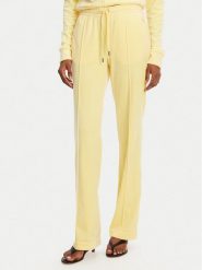 Juicy Couture Spodnie dresowe Tina JCAPW045 Żółty Regular Fit. Żółte spodnie dresowe damskie Juicy Couture, s, bez wzorów, z dresówki. Za 219.99 zł.