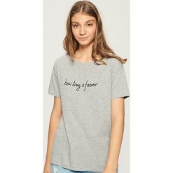 T-shirt z napisem - Jasny szar. T-shirty damskie marki DOMYOS. W wyprzedaży za 14.99 zł.