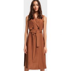 Sukienka szmizjerka - Brązowy. Sukienki damskie marki Reserved. Za 179.99 zł.