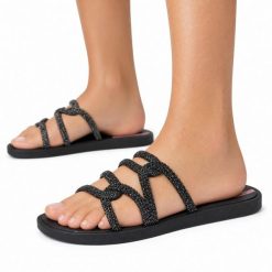 Klapki damskie Ipanema 27286 SOLAR GLOW SLIDE AD. Czarne klapki damskie Ipanema, bez wzorów, z materiału, klasyczne, bez obcasa. Za 69.00 zł.
