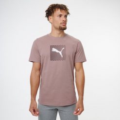 Koszulka z krótkim rękawem męska Puma Gym & Pilates. Brązowe koszulki sportowe męskie Decathlon, m, bez wzorów, z bawełny, bez kołnierzyka, bez ramiączek, na jogę i pilates. Za 79.99 zł.