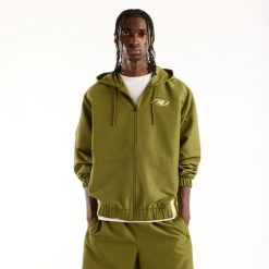 Kurtka męska New Balance MJ62Y8SJGEE – zielona. Zielone kurtki męskie New Balance, na jesień, m, bez wzorów, z materiału, klasyczne, z kapturem. Za 419.99 zł.