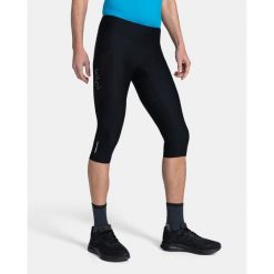 Męskie legginsy kompresyjne 3/4 Kilpi TERRY-M. Czarne legginsy sportowe męskie Kilpi, m, bez wzorów, z materiału, do biegania. Za 153.53 zł.