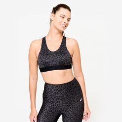 Stanik sportowy Domyos. Czarne bluzy sportowe damskie DOMYOS, xl, bez wzorów, z elastanu, bez kaptura, na jogę i pilates. W wyprzedaży za 49.99 zł.