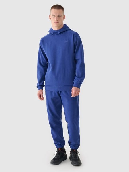 4F Spodnie dresowe joggery męskie - granatowe XL. Niebieskie spodnie sportowe męskie 4f, l, bez wzorów, z bawełny. W wyprzedaży za 89.99 zł.