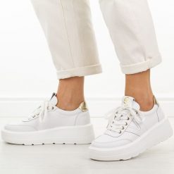 Białe skórzane sneakersy damskie na platformie Vinceza 39976. Białe obuwie sportowe damskie VINCEZA, bez wzorów, z dresówki. Za 239.00 zł.