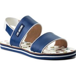 Sandały LOVE MOSCHINO - JA16342G05JA170A Vit.Btt/Vit.Cuo.Bi. Niebieskie klapki damskie Love Moschino, bez wzorów, z materiału, bez obcasa. W wyprzedaży za 309.00 zł.