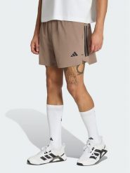 Adidas Szorty sportowe D4T Primelift 3 Stripes KS1149 Beżowy Regular Fit. Brązowe krótkie spodenki sportowe męskie Adidas, m, bez wzorów, z syntetyku, na fitness i siłownię. Za 178.99 zł.