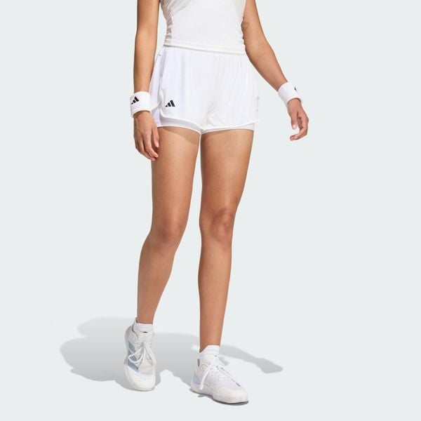 SZORTY TENNIS CLIMACOOL 2IN1 MATCH. Białe szorty sportowe damskie Adidas, l, bez wzorów, z elastanu, klasyczne, z podwyższonym stanem, tenisowe, climacool (adidas). Za 239.00 zł.
