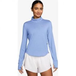 Koszulka treningowa damska Nike HQ0499468ALUMINUMRE. Niebieskie koszulki sportowe damskie Nike, l, bez wzorów, bez kołnierzyka, bez ramiączek, na fitness i siłownię. Za 459.99 zł.