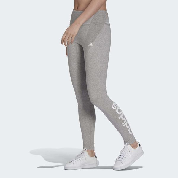 Leginnsy Essentials High-Waisted Logo. Białe legginsy damskie Adidas, bez wzorów, na fitness i siłownię. Za 103.00 zł.