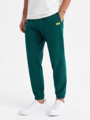 Klasyczne dresowe spodnie unisex ze ściągaczami ciemnozielone V17 OU-PSBC-0100 XL/XXL. Zielone spodnie sportowe męskie Ombre, m, bez wzorów, z dresówki. Za 302.57 zł.
