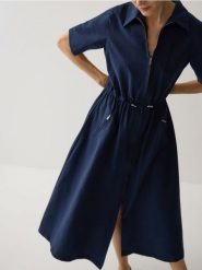 Koszulowa sukienka z bawełną - granatowy. Niebieskie sukienki damskie Reserved, l, bez wzorów, z bawełny, bez kołnierzyka, bez ramiączek, midi, koszulowe. W wyprzedaży za 99.99 zł.