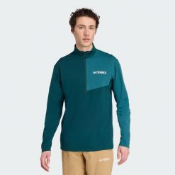 Koszulka Terrex Multi Climacool 1/2 Zip Long Sleeve. Niebieskie koszulki sportowe męskie Adidas, xs, bez wzorów, bez kołnierzyka, bez ramiączek, trekkingowe, climacool (adidas). W wyprzedaży za 168.35 zł.