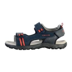 Sandały GEOX JR SANDAL STRADA A Niebieski. Niebieskie sandały męskie Geox, ze skóry, bez zapięcia. Za 152.99 zł.