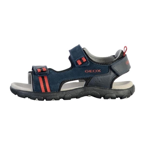 Sandały GEOX JR SANDAL STRADA A Niebieski. Niebieskie sandały męskie Geox, ze skóry, bez zapięcia. Za 154.99 zł.