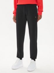 Guess Spodnie dresowe V4YB08 KCAY2 Czarny Regular Fit. Czarne spodnie dresowe damskie Guess, xl, z aplikacjami, z dresówki. Za 239.99 zł.