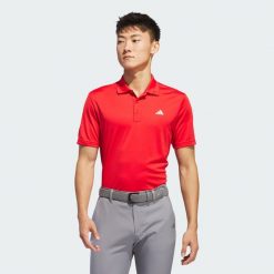 Koszulka Adi Performance Polo. Czerwone koszulki polo męskie Adidas, xs, bez wzorów, z materiału, bez kołnierzyka, bez ramiączek, na golfa. Za 174.80 zł.