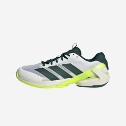 Buty tenisowe męskie ADIDAS Adizero Ubersonic 5 na każdą nawierzchnię. Buty sportowe męskie Adidas, z tworzywa sztucznego, bez zapięcia, tenisowe. W wyprzedaży za 279.99 zł.