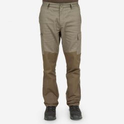 Spodnie outdoor renfort 100. Brązowe spodnie sportowe męskie SOLOGNAC, l, bez wzorów, z bawełny, outdoorowe. Za 129.99 zł.