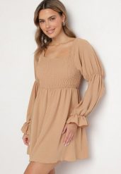 Beżowa Rozkloszowana Sukienka z Elastyczną Górą i Falbankami przy Rękawach Saviella. Brązowe sukienki damskie Born2be, na co dzień, bez wzorów, z jeansu, eleganckie, bez kołnierzyka, bez ramiączek, mini, rozkloszowane. Za 69.99 zł.