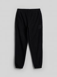 4F Spodnie polarowe joggery męskie - czarne M. Czarne spodnie sportowe męskie 4f, m, bez wzorów, z dresówki, na fitness i siłownię. Za 149.99 zł.