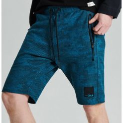 Szorty camo o kroju jogger - Niebieski. Szorty męskie marki Cropp. Za 79.99 zł.
