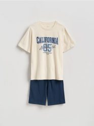 Dwuczęściowa piżama z nadrukiem - złamana biel. Piżamy męskie Reserved, l, bez wzorów, z bawełny, bez ramiączek. Za 89.99 zł.