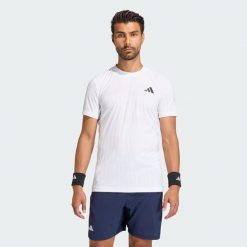 Koszulka Tenisowa Climacool+ Airchill Freelift. Białe koszulki sportowe męskie Adidas, bez wzorów, bez kołnierzyka, bez ramiączek, tenisowe, climacool (adidas). Za 259.00 zł.