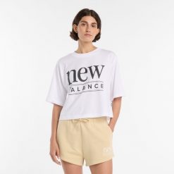 Koszulka damska New Balance WT61V5OPWT – biała. Białe t-shirty damskie New Balance, l, bez wzorów, z bawełny, bez kołnierzyka. Za 149.99 zł.