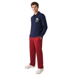 Koszulka sportowa polo męska Lacoste Polo. Niebieskie koszulki polo męskie Lacoste, l, z aplikacjami, z bawełny, eleganckie, bez ramiączek. Za 327.00 zł.