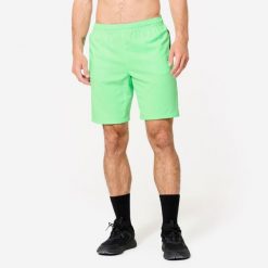 Spodenki fitness cardio męskie Domyos. Zielone krótkie spodenki sportowe męskie DOMYOS, m, bez wzorów, z elastanu, na fitness i siłownię. W wyprzedaży za 34.99 zł.