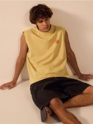 Bawełniany tank top - musztardowy. T-shirty męskie Reserved, l, bez wzorów, z bawełny, bez kołnierzyka. W wyprzedaży za 59.99 zł.