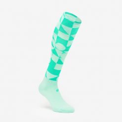 Skarpety piłkarskie Kipsta Viralto Check. Zielone legginsy sportowe męskie KIPSTA, bez wzorów, z dzianiny, do piłki nożnej. Za 24.99 zł.