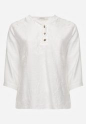 Biała Bluzka Ozdobiona Guzikami i Haftowanymi Kwiatami Delmana. Białe bluzki damskie Born2be, plus size, z aplikacjami, z materiału, casualowe, bez kołnierzyka, plus size, bez ramiączek. Za 69.99 zł.