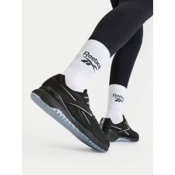 Buty na siłownię Reebok. Czarne obuwie sportowe damskie Reebok, bez wzorów, na fitness i siłownię. Za 599.99 zł.