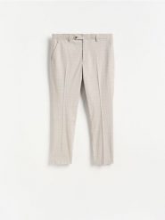 Eleganckie spodnie slim fit w kratę - brązowy. Brązowe eleganckie spodnie męskie Reserved, l, bez wzorów, z tkaniny. Za 169.99 zł.