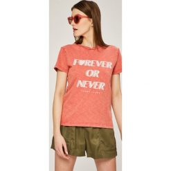 Tommy Jeans - Top. Topy damskie marki Tommy Jeans. W wyprzedaży za 129.90 zł.