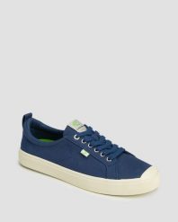 Tenisówki Cariuma OCA Low Shadow Blue Canvas Unisex. Niebieskie trampki i tenisówki damskie CARIUMA, bez wzorów, z gumy, klasyczne, bez zapięcia. Za 215.25 zł.