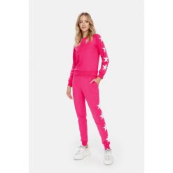 Spodnie fitness damskie Cardio Bunny Jenny. Czerwone obuwie sportowe damskie Cardio Bunny, l, bez wzorów, z bawełny. Za 99.00 zł.